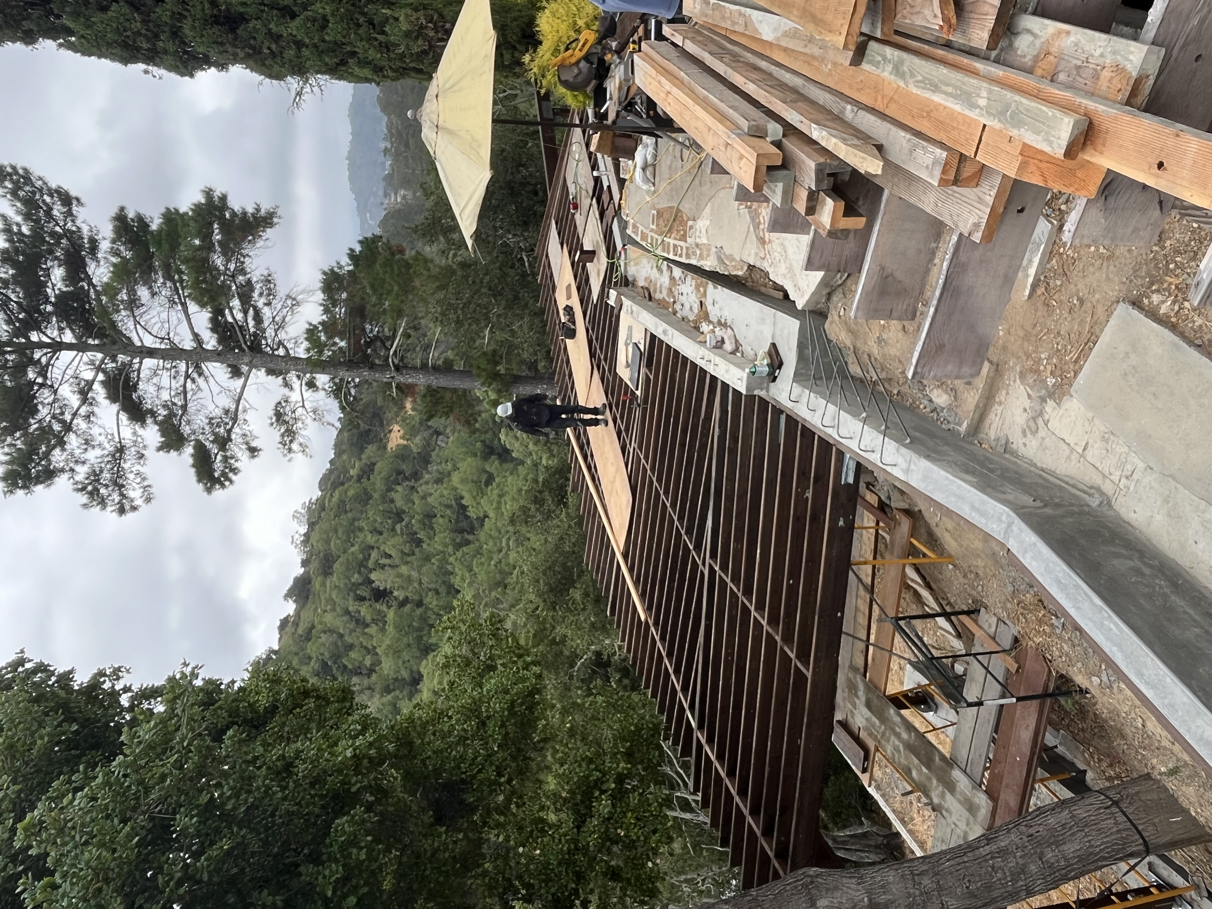 Worker on steel frame in scenic location